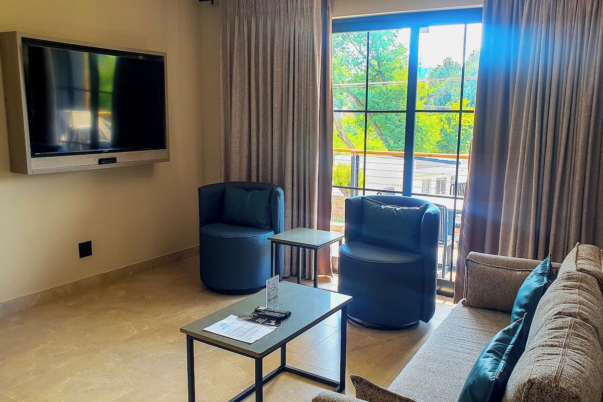 Two Bedroom Apartment with Private Boardroom. | Living area