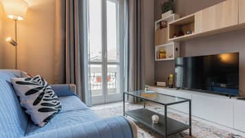 Basic Apartment, Balcony | Living room | 30-inch TV with satellite channels