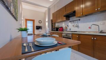 Basic Apartment, Balcony | Dining room