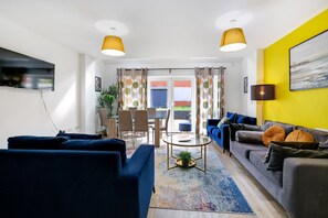 Family House | Living area | 42-inch Smart TV with satellite channels, Netflix, streaming services