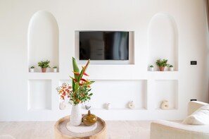 Villa, Pool View | Living area | Flat-screen TV