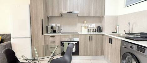 Een magnetron, een oven, een kookplaat