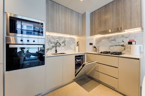 Apartamento conforto, vista para a cidade | Cozinha privada | Máquina de café expresso, cafeteira/chaleira, chaleira elétrica