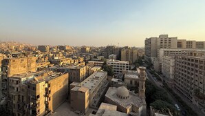A densely packed urban area with various building types, including residential and commercial structures. - Golden mile - Downtown Cairo (Cairo)