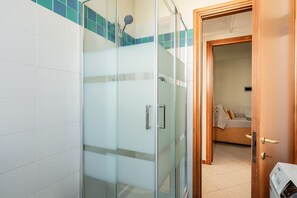 Shower, free toiletries, hair dryer, bathrobes