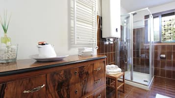 Apartment, Patio, Garden View | Bathroom | Hair dryer, towels