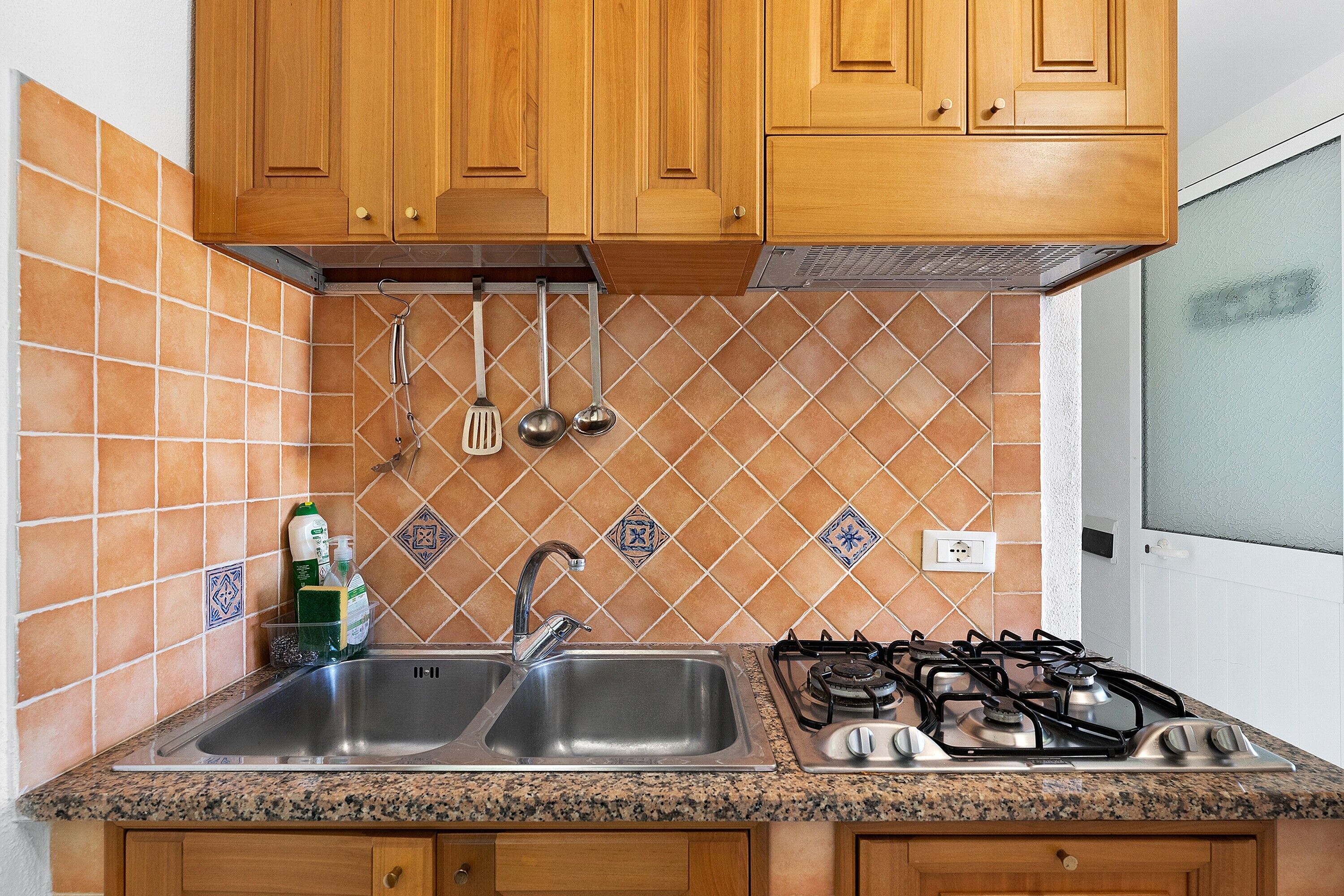Fridge, stovetop, cookware/dishes/utensils