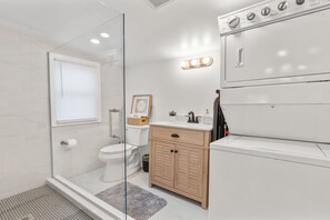 Shower, hair dryer, towels