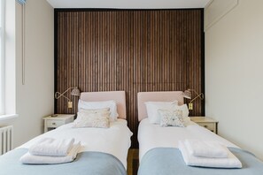 2 habitaciones, tabla de planchar con plancha, internet y ropa de cama 