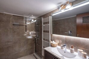 Shower, hair dryer, soap, shampoo