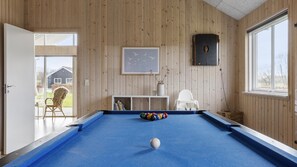 A pool table in a room with wooden walls, a framed picture, and a window. - VillaVilla 286 - Nordals, Sydjylland (Nordborg)