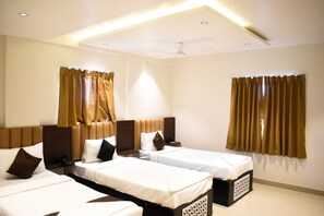 Classic Triple Room | Iron/ironing board, free WiFi - Hotel lotus exicutive  (Pune)