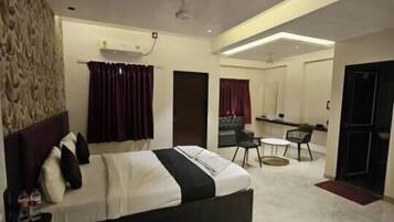 Superior Studio Suite, Balcony, City View | Iron/ironing board, free WiFi