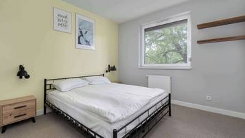 1 bedroom, desk, iron/ironing board, travel cot