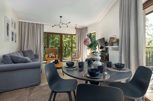 Spacious Apartment | 2 Balconies and Garage | Close to Trails