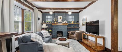 TV, fireplace, books, offices