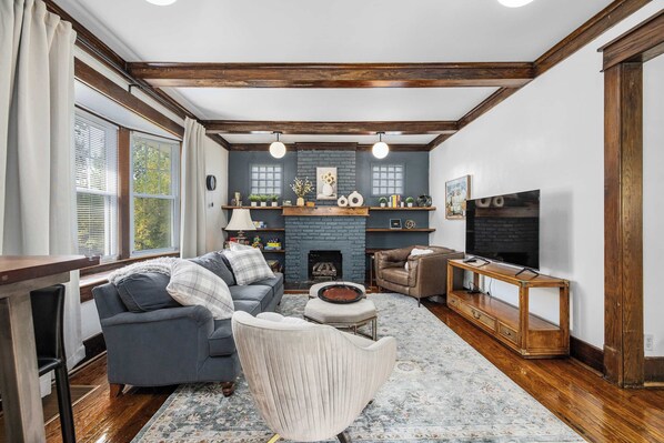 TV, fireplace, books, offices