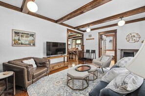 TV, fireplace, books, offices