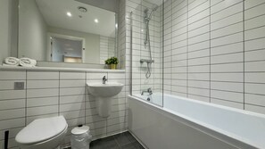 Hair dryer, towels, soap, shampoo