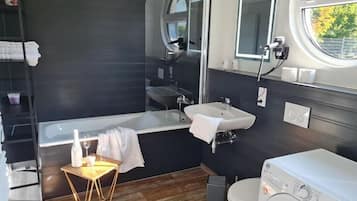 Hair dryer, towels, soap, toilet paper