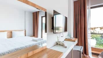 Cortinas blackout, tabla de planchar con plancha y wifi gratis