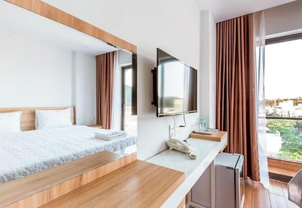 Quarto luxo, vista para o mar | Cortinas blackout, ferros/tábuas de passar roupa, Wi-Fi de cortesia