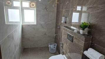 Shower, free toiletries, towels, soap