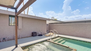 A swimming pool with a clear blue water feature, a pergola, and a small seating area with a table and chairs. - Mtn-view Getaway w/ Pool: 4 Mi to Dtwn Palm Desert (Palm Desert)