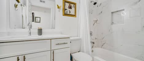Hair dryer, towels, soap, toilet paper