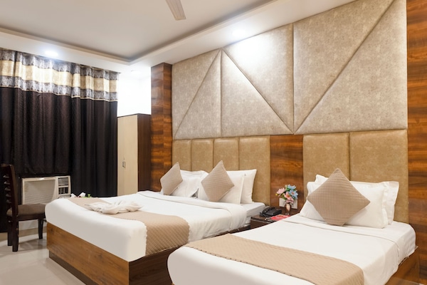 Premium bedding, pillowtop beds, desk, laptop workspace