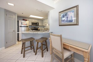 Condo, 2 Bedrooms | Private kitchen | Fridge, oven, coffee/tea maker