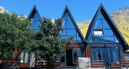 Villa Kazbegi Cottages. Three Cottage in One space with 2 Bedroom