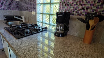 Fridge, stovetop, coffee/tea maker, toaster