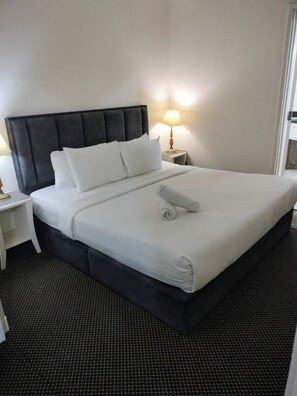 Suite Deluxe | Ropa de cama de alta calidad y camas con efecto memoria 