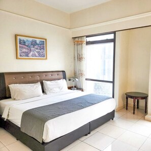 Suite familiar, 2 habitaciones, vista a la ciudad | Ropa de cama de alta calidad y camas con efecto memoria