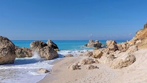A rocky beach with clear blue water and a clear sky. - Madreterra - Six Bedroom Villa, Sleeps 12 (Lefkada)