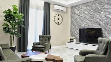 Family Room, 2 Bedrooms, Non Smoking, Kitchen | Living room | 75-inch flat-screen TV with digital channels