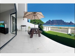 Comfort Apartment, Beach View | In-room safe, iron/ironing board, free WiFi
