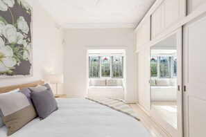 4 bedrooms, desk, iron/ironing board, travel cot