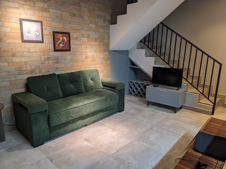 Comfort Chalet | Living area. Alta Vista Chalés