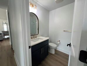 Shower, towels, soap, toilet paper