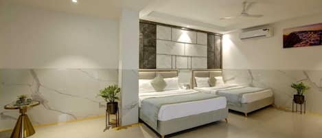 Premium bedding, memory foam beds, desk, laptop workspace