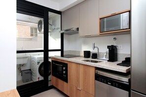 Fridge, microwave, cookware/dishes/utensils