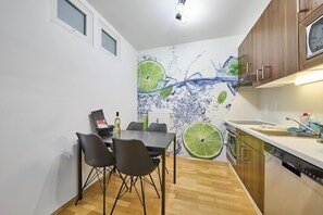 Basic Apartment, 2 Bedrooms, Balcony, Garden View | In-room dining