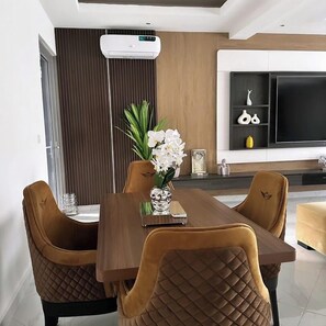 Economy Apartment, Balcony, City View | Dining room