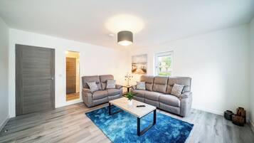 Departamento, 2 habitaciones, planta baja | Área de sala de estar