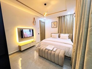 Family Apartment, Balcony, City View | Desk, laptop workspace, blackout drapes, soundproofing