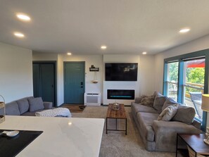 Smart TV, fireplace, books