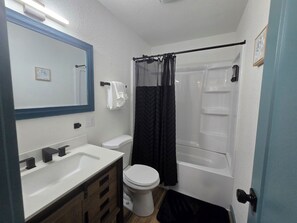 Hair dryer, towels, soap, toilet paper