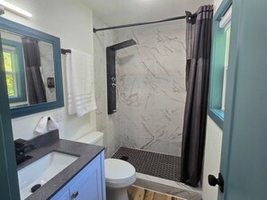 Hair dryer, towels, soap, toilet paper